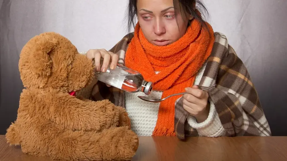 Eine kranke Frau (Symbolbild). Eine kranke Frau (Symbolbild).